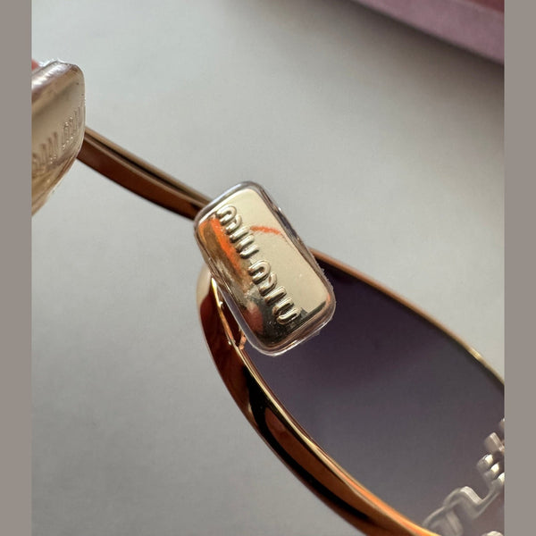 מיו מיו מסגרת מתכת דקה