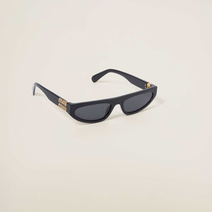 משקפיים מיו מיו עם מסגרת עבה, צבע שחור, הגנה 100% UVA/UVB, מתכת ופלסטיק.