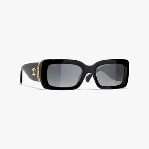 Chanel sunglasses with black and gold frame, UV protection, adjustable nose pads, and replica details.
