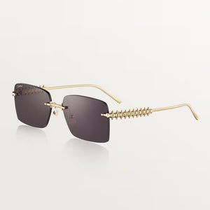 Cartier luxury sunglasses with gold-plated metal frame and UV400 lenses.