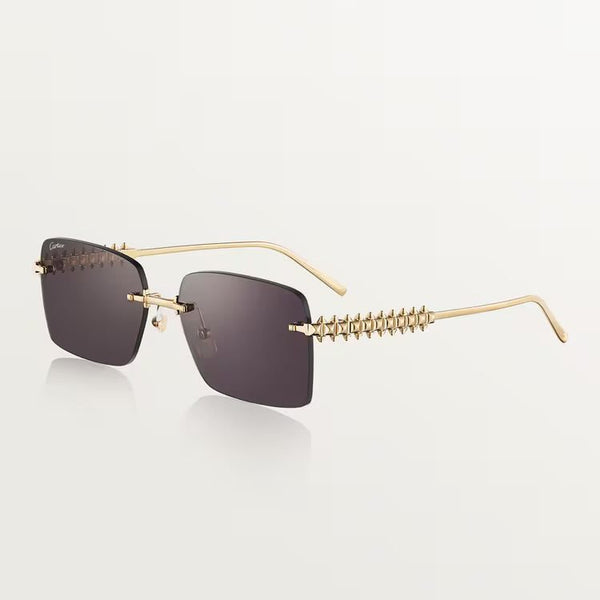Cartier luxury sunglasses with gold-plated metal frame and UV400 lenses.
