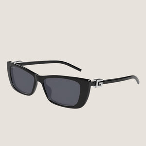 Iconic Gucci sunglasses with sleek black frames and UV400 lenses, combining luxury and modern style.