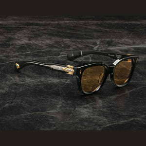 משקפי שמש Jacques Marie Mage MOJAVE בצבע שחור עם מסגרת פלסטיק, עדשות עם 100% הגנה UVA/UVB.