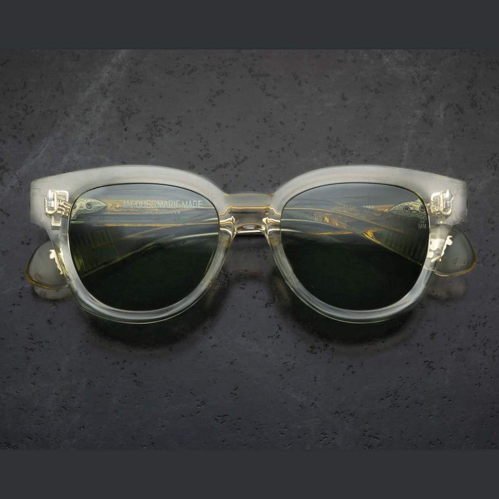 משקפי שמש Jacques Marie Mage MOJAVE שקוף עם מסגרת פלסטיק שקופה, הגנה UVA/UVB, רפידות אף מתכווננות.